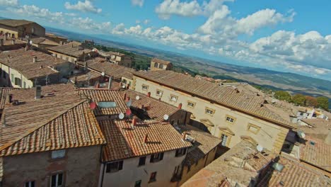 fast aerial over the walled town of volterra, province of pisa, italy