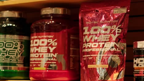 sport nutrition store interior with large choice of nutritional supplements.