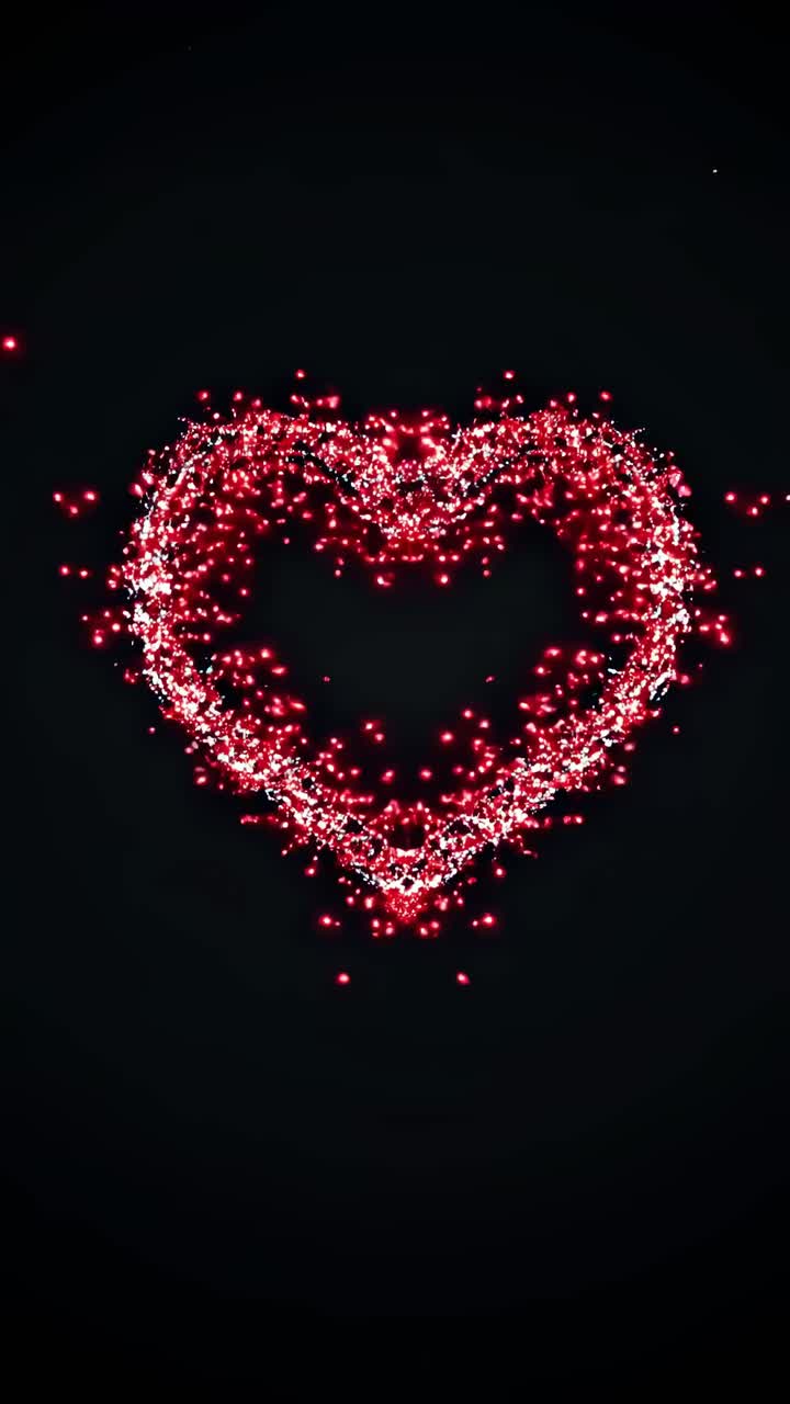 Vista aerea di un cuore digitale fatto di particelle rosse su sfondo nero, che ricorda un rendering dinamico in 3D