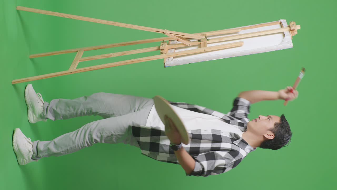 그린 스크린에 있는 예술가의 그림