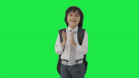 Happy-Indian-school-boy-clapping-and-appreciating-Green-screen