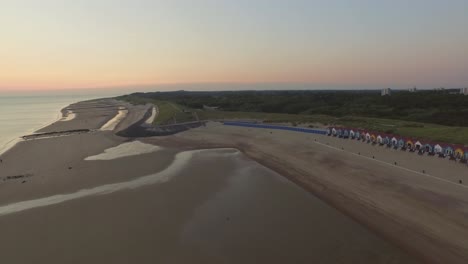 aerial: the beach between vlissingen and dishoek during sunset