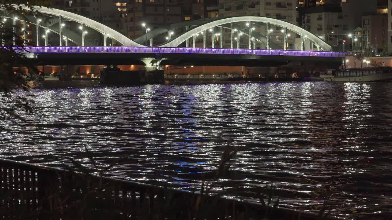 Bridge over a river at night