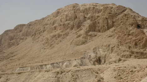 panning view of the hills and caves at qumran