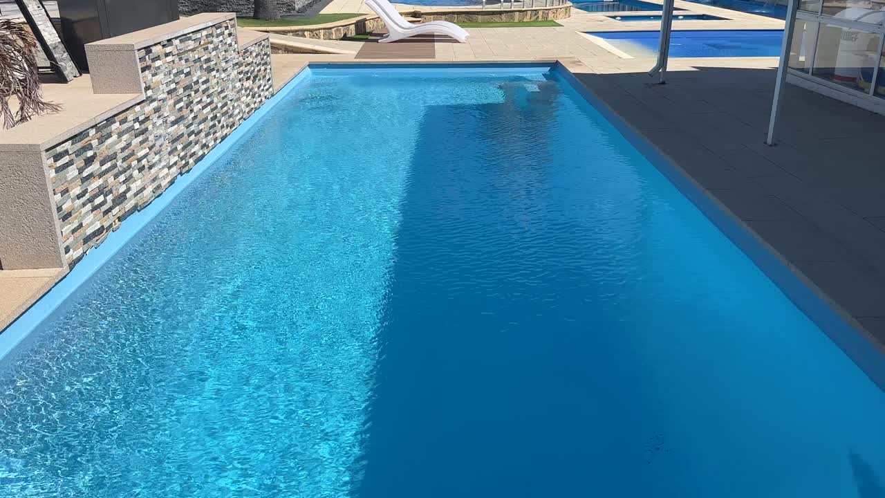 Swimming outdoor display pool blue water sunny day Perth Western Australia