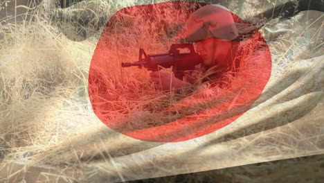 animation of flag of japan over caucasian male soldier with rifle