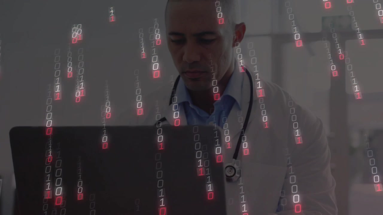 Typing doctor in lab coat with stethoscope at clinic laptop, binary overlay appearing during review