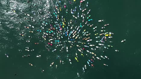 Aerial-over-surfers-in-circle-during-BLM-Black-Lives-Matter-Paddle-For-Freedom-gathering-in-California-4