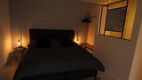 black bed in the bedroom at night