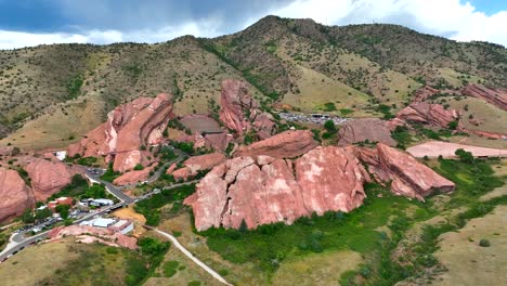 wide aerial drone orbit of red rocks amphitheater concert venue near denver, colorado ,usa