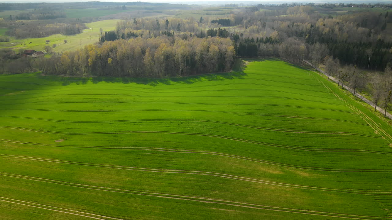 Stunning rolling green fields in the rural town of Pieszkowo Poland