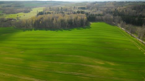 stunning rolling green fields in the rural town of pieszkowo poland