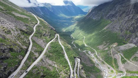 Trollstigen-Mountain-Pass,-Norway---Scenic-route-and-famous-tourist-attraction-in-Andelsnes,-Romsdalen-Valley---Tilting-Down