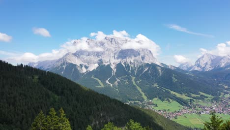 austrian alps zugspitze mountain clouds horses