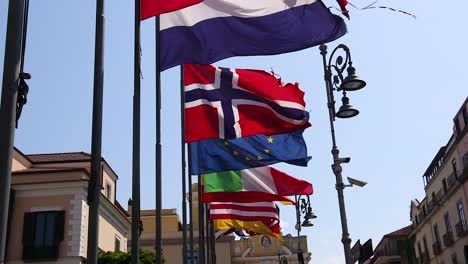 multiple flags waving in the wind