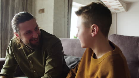 Caucasian-man-and-boy-in-the-living-room