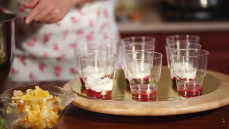 making layered dessert parfaits