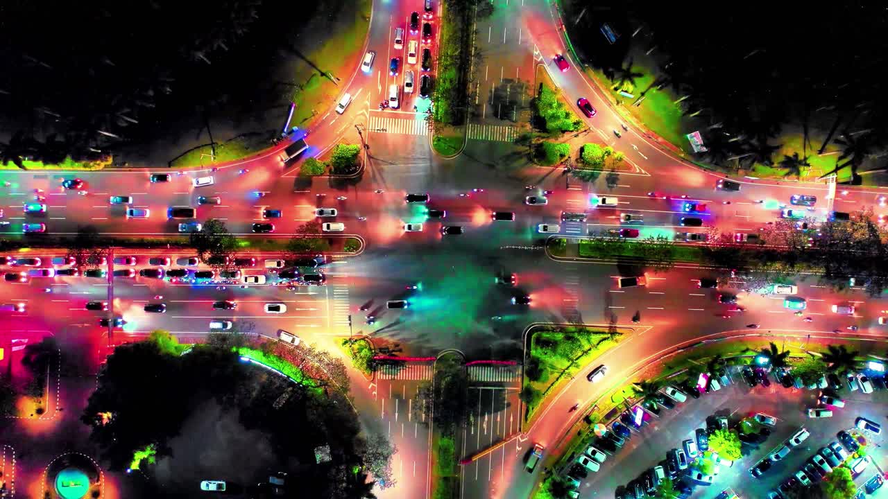 Colorful rush-hour lights streak across downtown roadways