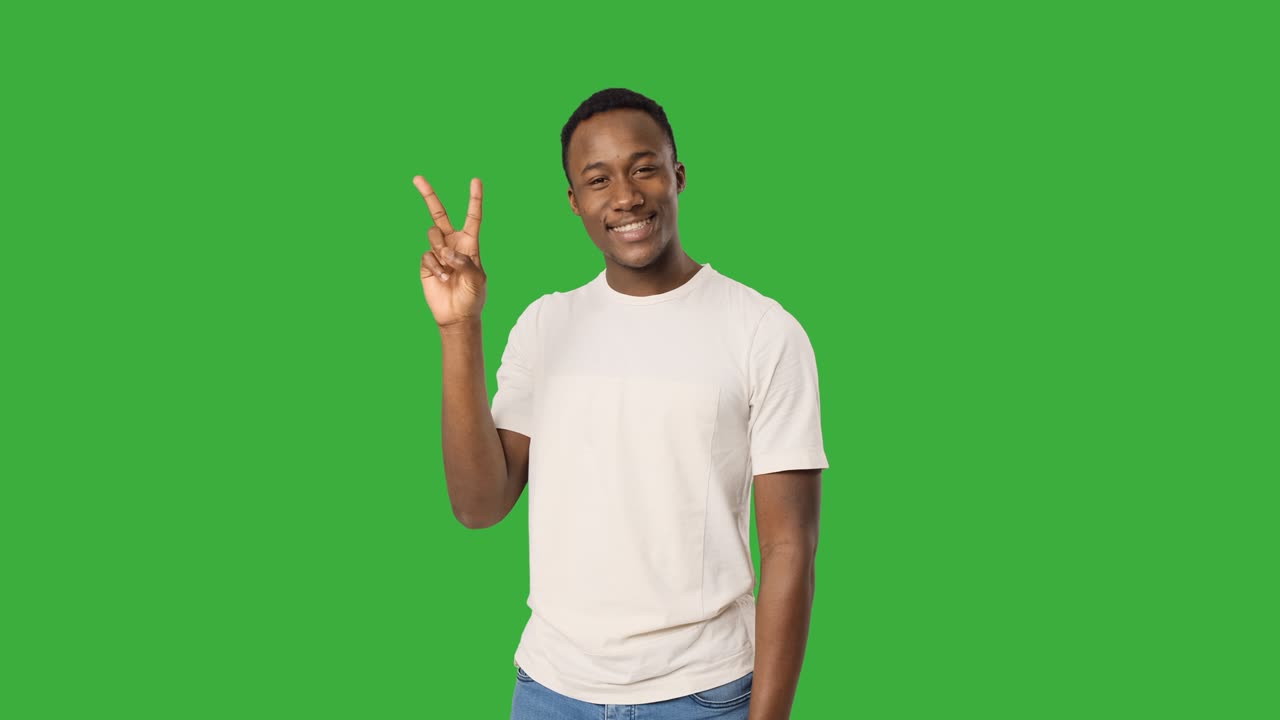 Happy man giving v hand sign
