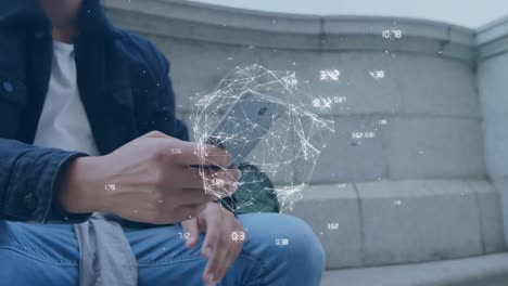 Animation-of-digital-globe-and-data-processing-over-man-using-smartphone