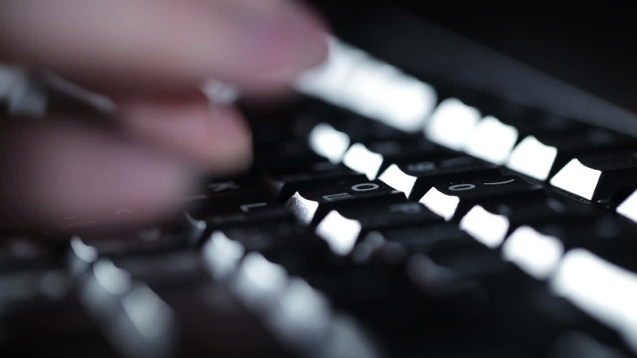 Typing on the keyboard at night