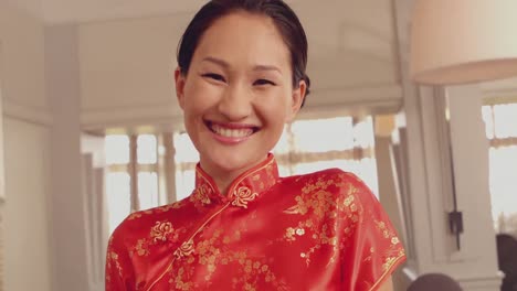 asian waitress smiling at camera