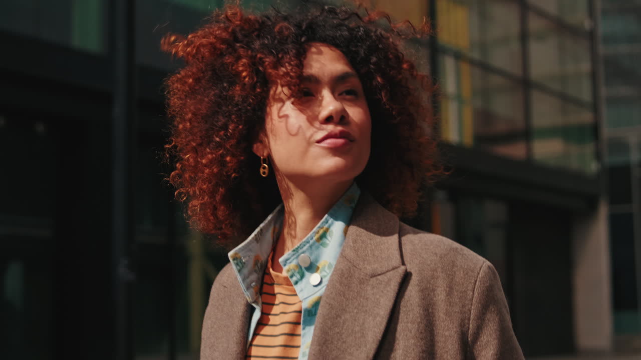 Confident Young Woman Walking in the City