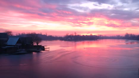 sunrise at an icey lake in winter drone footage recorded with a dji spark 1080p 30fps