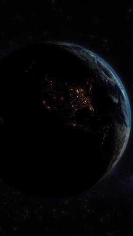 vertical video of planet earth from space with usa mexico with night lights transitioning to daylight with stars in background.