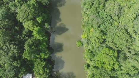 An-aerial,-top-down-view-of-the-Big-Island-Slough,-including-the-kayak-and-canoe-launch-and-recreation-areas-in-Pasadena,-Texas