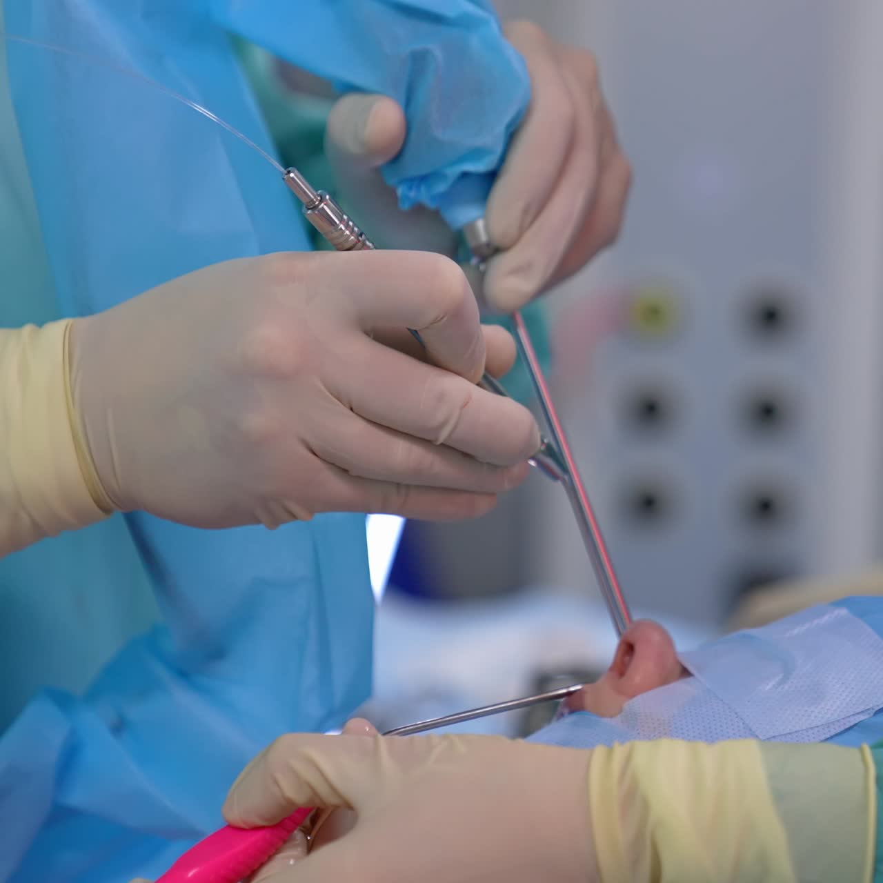 Professional neurosurgery equipment in doctor hands. Modern equipment in operating room