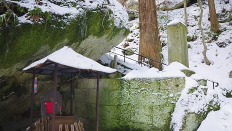 snow falling on the mountain path of yamadera, winter in northern japan