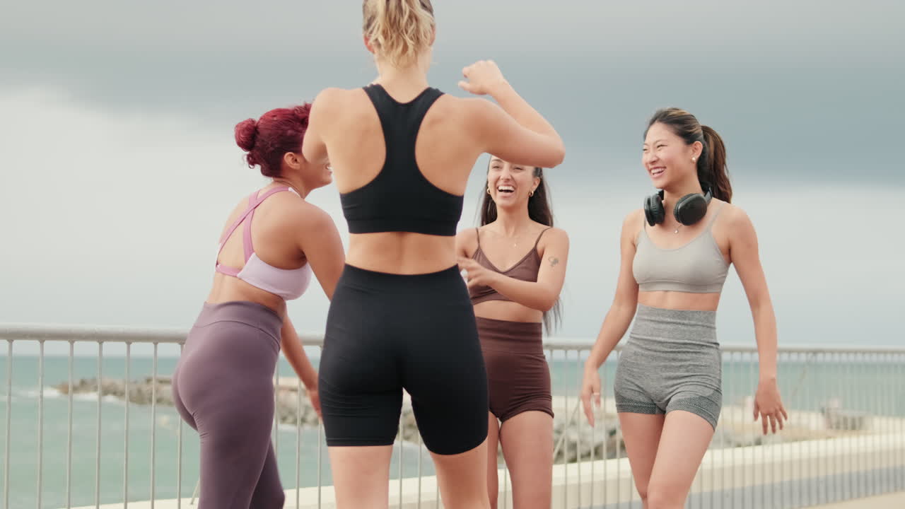 Fitness Friends Celebrate Workout By The Beach