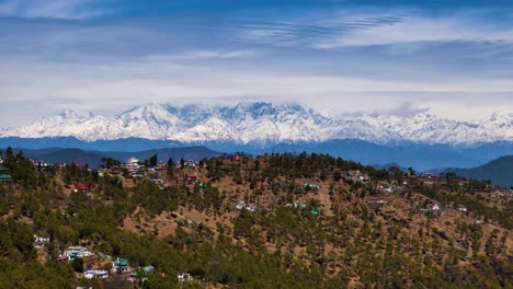 snow-capped mountains and village landscape