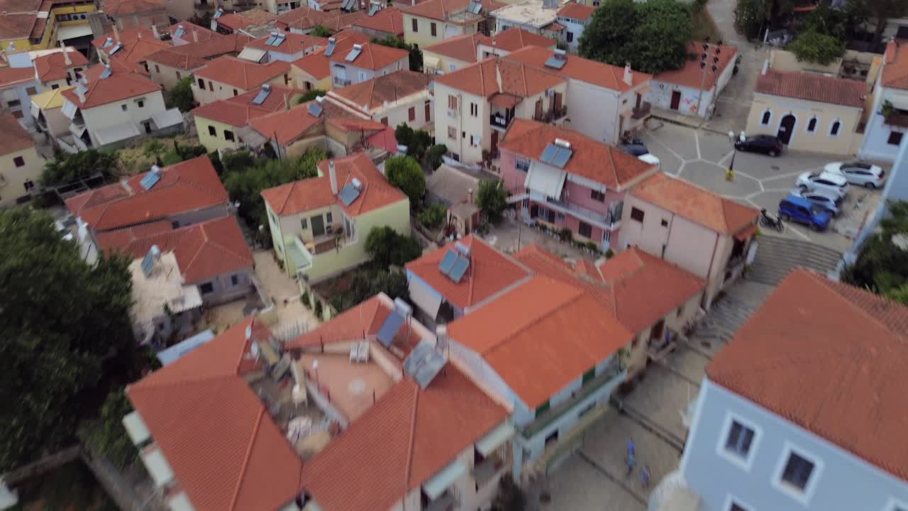 Aerial tilt down, push in establishing shot of iconic cathedral church Ypapanti located at historical center of Kalamata 4K