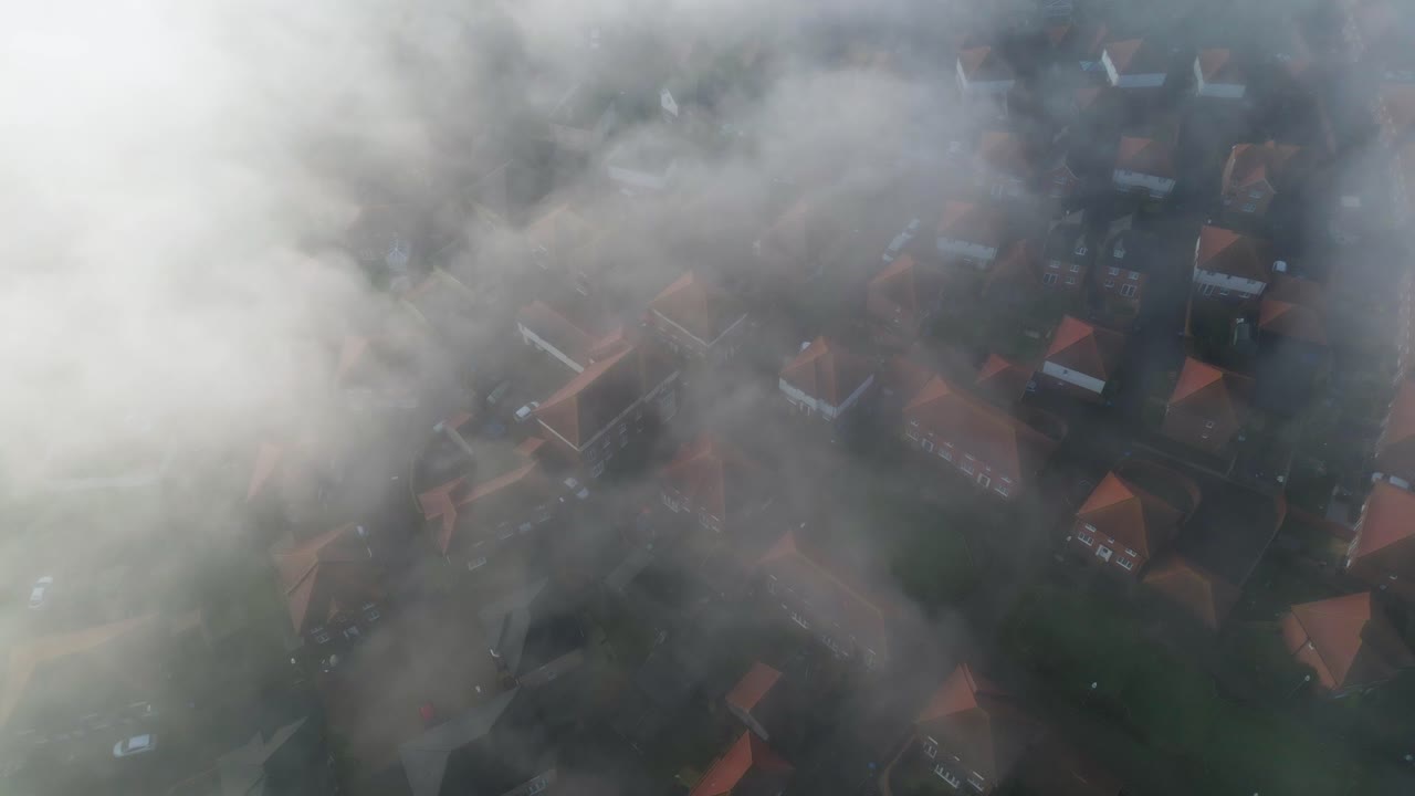 Thin layer of fog rolling over new build houses in Aylesham