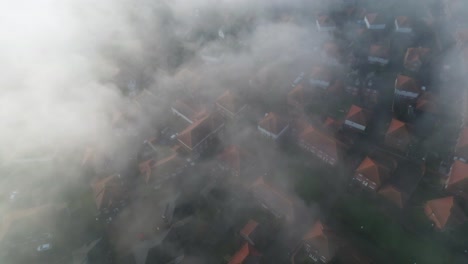 thin layer of fog rolling over new build houses in aylesham
