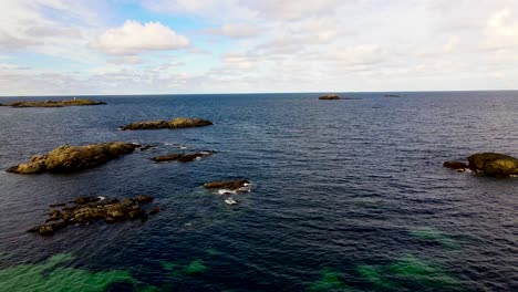 AERIAL:-Small-islands-in-the-crystal-clear-arctic-ocean