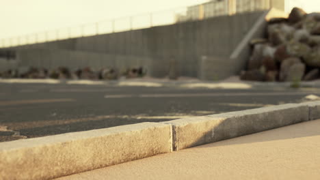 empty beach car park spaces covered in asphalt.