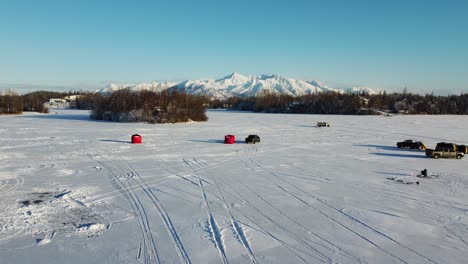 Aerial-footage-of-ice-fishing-in-Alaska