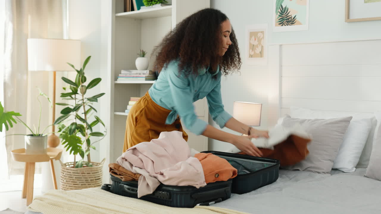 Black woman, suitcase and packing for travel