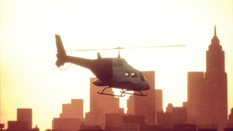 silhouette helicopter at city scape background