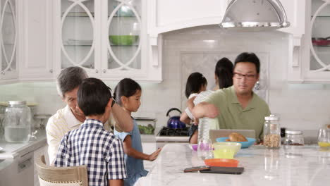 extended family group eating breakfast at home shot on r3d