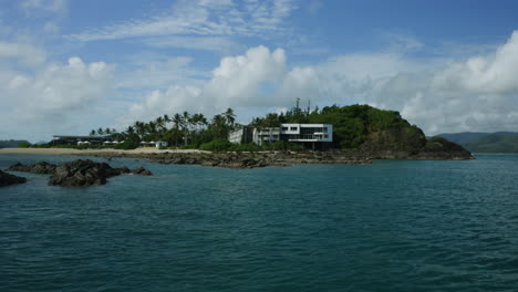 private tropical island in australia with buildings