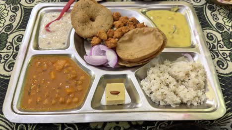closeup of indian vegiterian food on table for the big feast during the festival