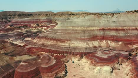 Bentonite-Hills,-Capitol-Reef-National-Park-At-Daytime---aerial-pullback