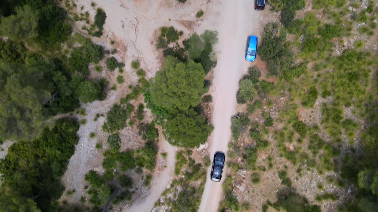 Journey along the winding roads of Coll Baix in Mallorca, witness stunning landscapes and the lush surroundings of Mal Pas while experiencing tranquility in nature.