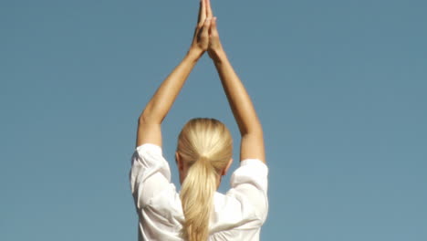 happy woman doing yoga class