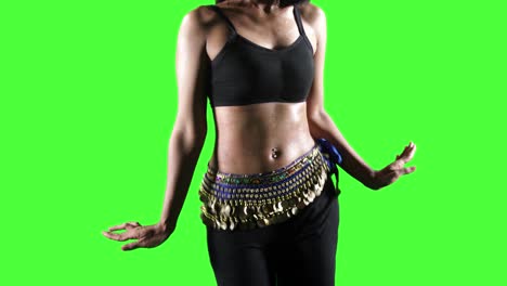 unknown young woman dancing zumba in studio