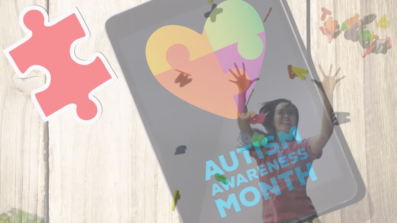 este video muestra piezas de rompecabezas rojas y amarillas cayendo sobre el texto en un teléfono inteligente, simbolizando el apoyo